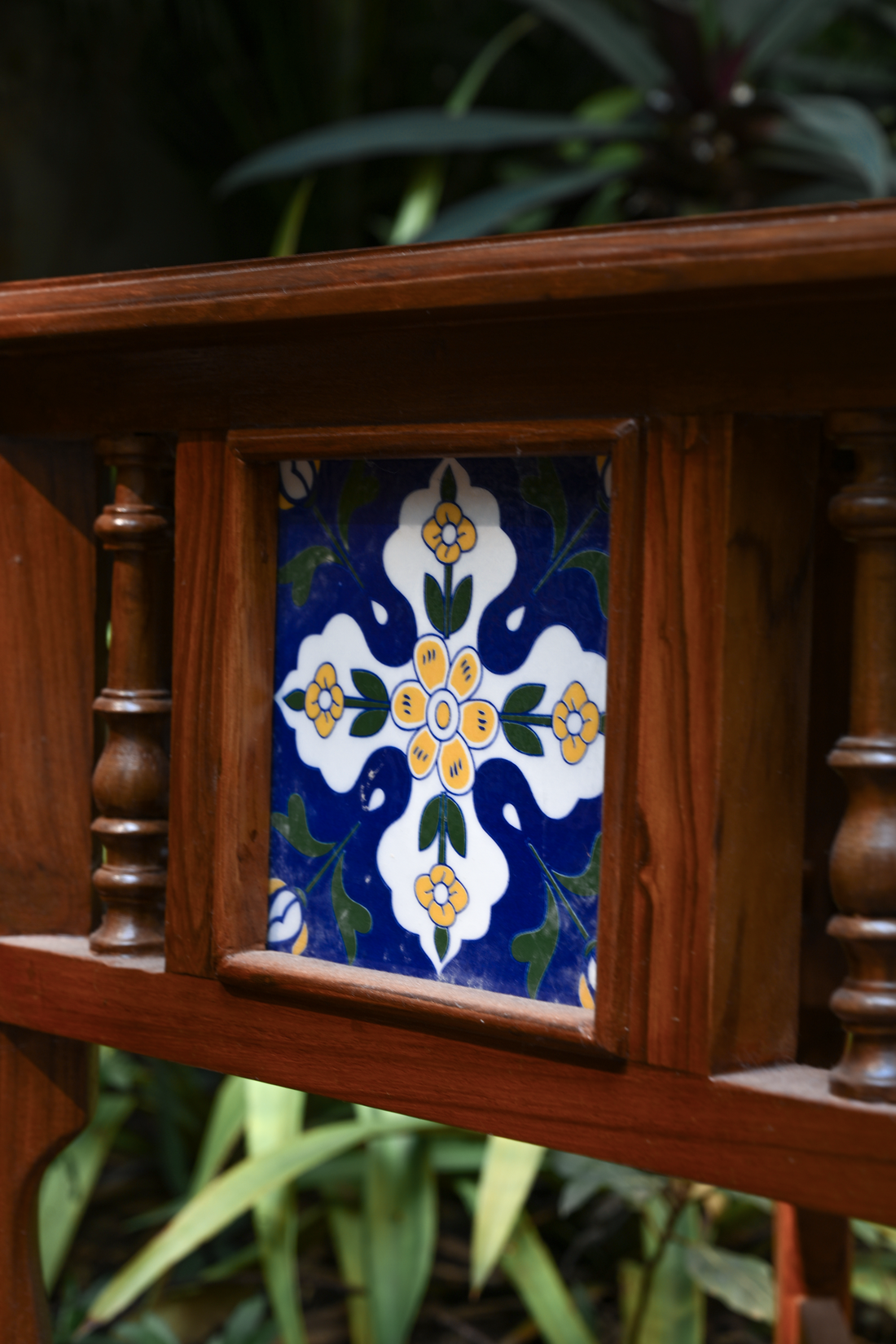 BOTANICAL SYMMETRY – PAIR OF TEAK SIDE TABLES WITH CERAMIC TILE INLAYS