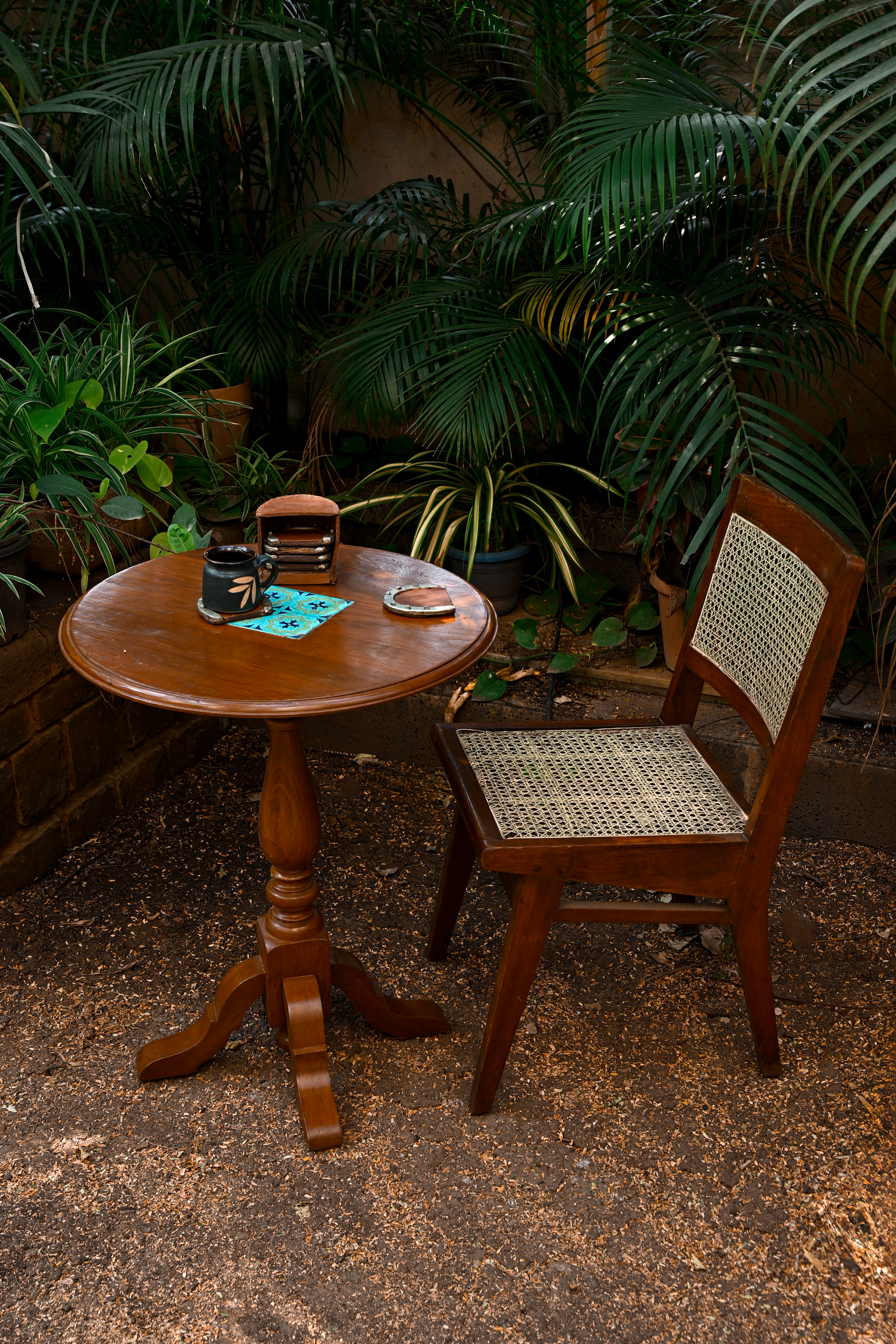 PEACOCK PEDESTAL ROUND PEDESTAL TABLE - COLONIAL TEAK