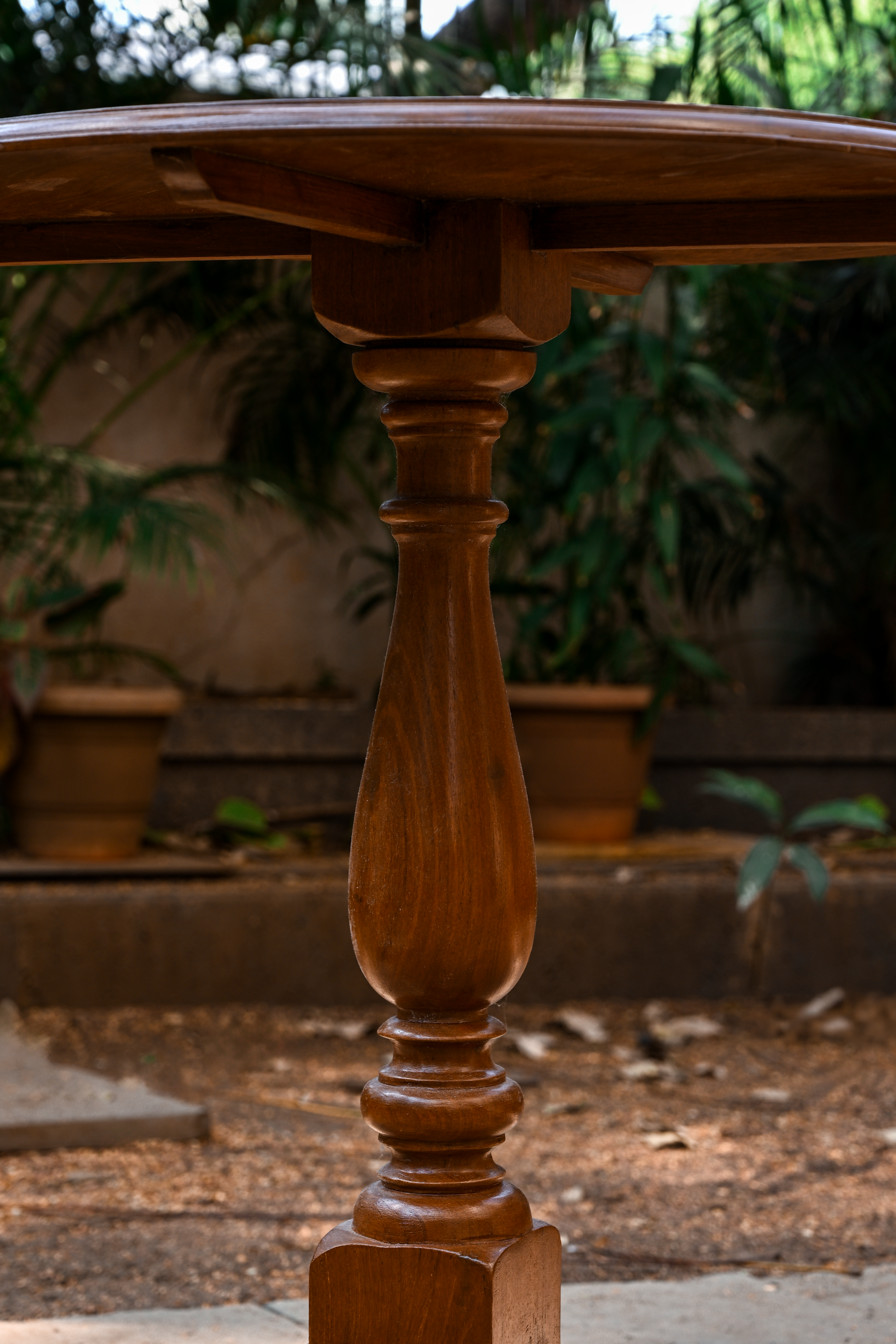 PEACOCK PEDESTAL ROUND PEDESTAL TABLE - COLONIAL TEAK